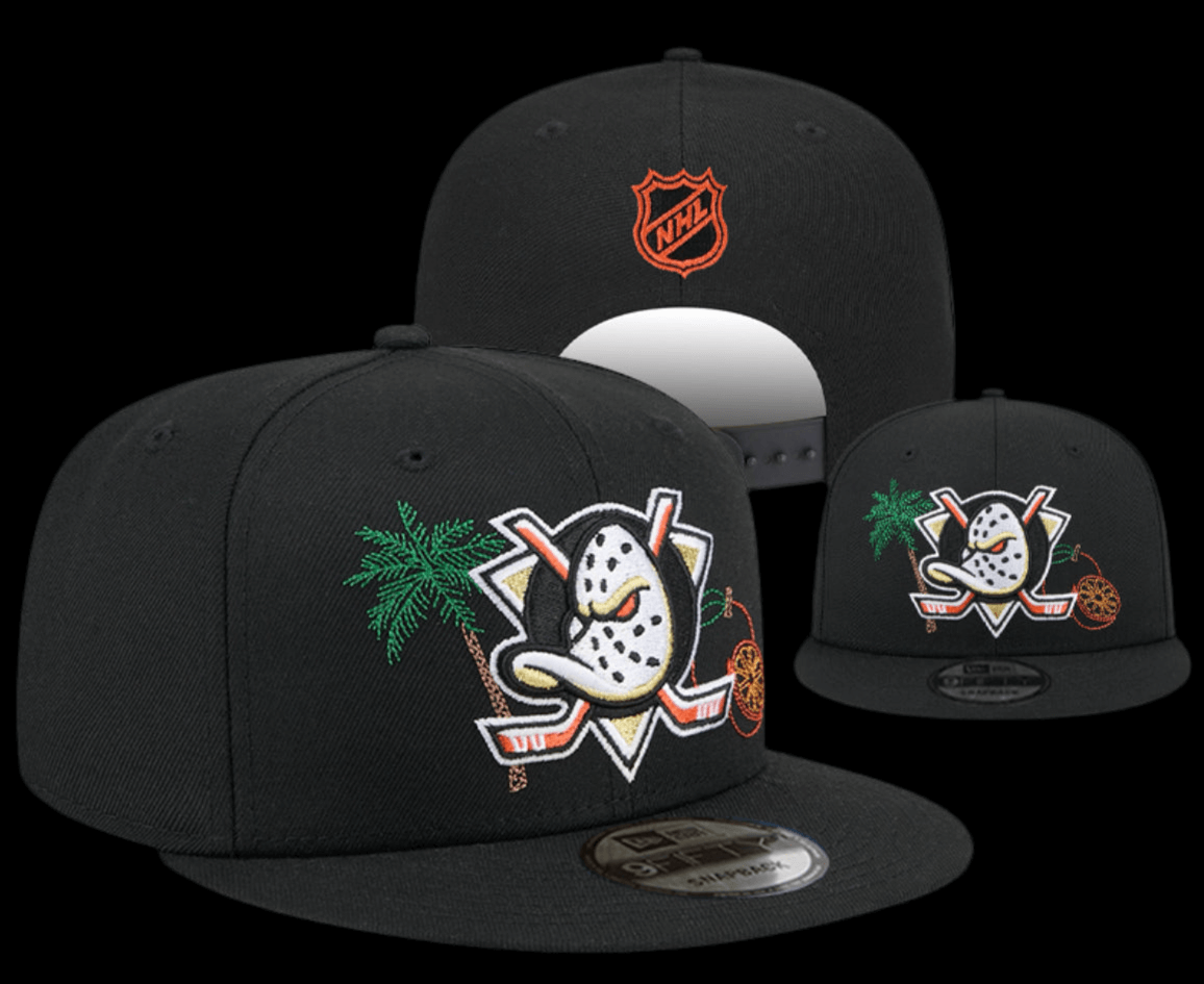This MIGHTY DUCKS SNAPBACK HAT is the perfect accessory for any fan. Featuring an adjustable snapback design, it offers a comfortable fit for all head sizes. With its high-quality materials and embroidered team logo, you can proudly show off your love for